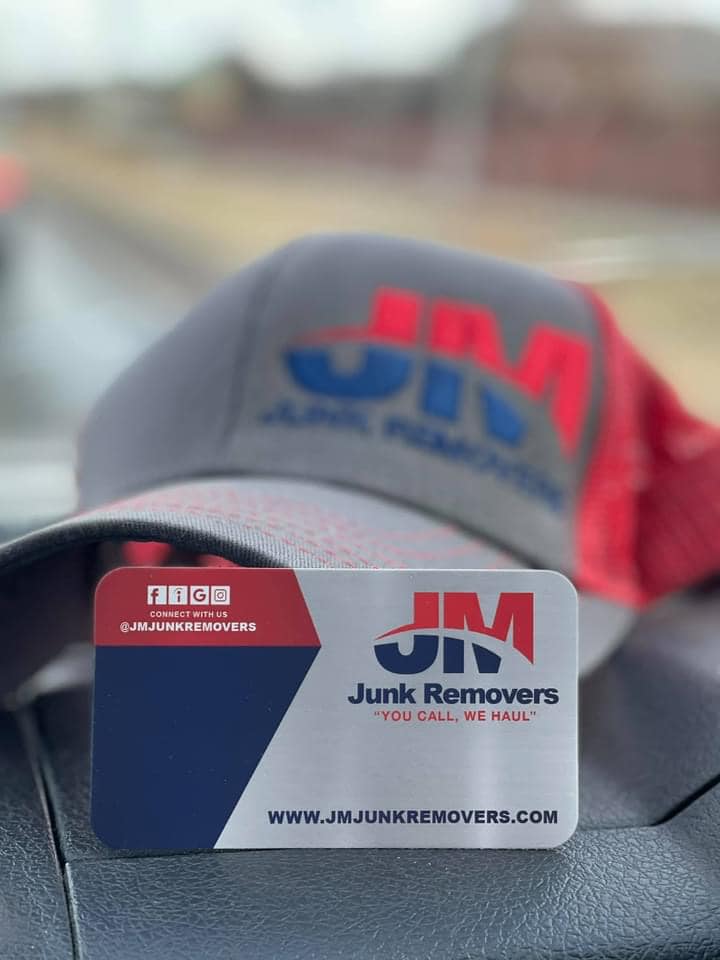 jm junk removal hat and business card