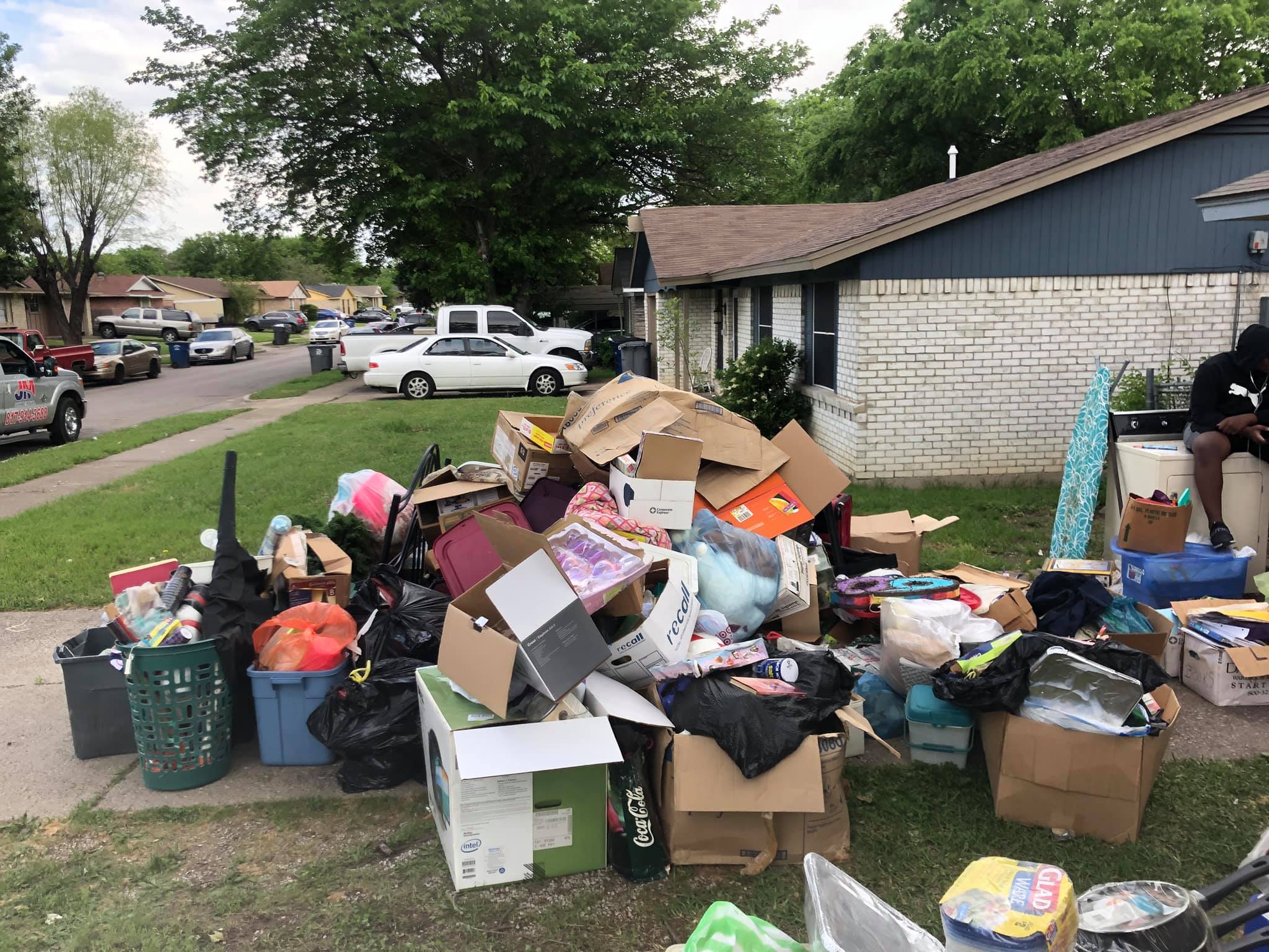 junk piled up on lawn