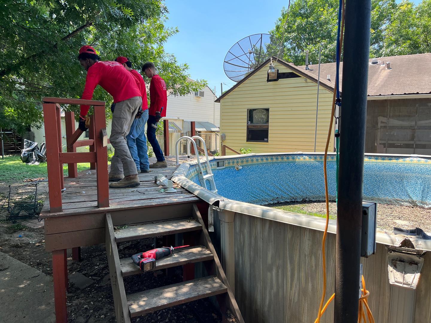 above ground pool tearing off the wood fence