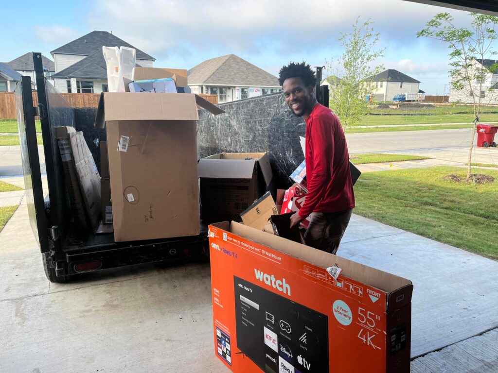 getting rid of electronics and a tv and piling it into the truck
