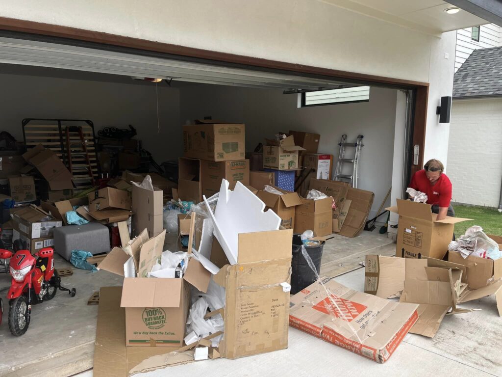 alot of cardboard boxes in a garage