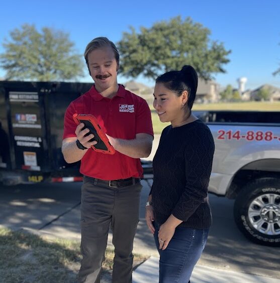JM junk removers team talking with customer
