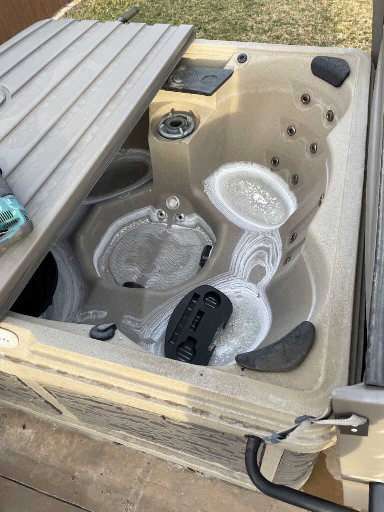 old hot tub needing removal in north dallas