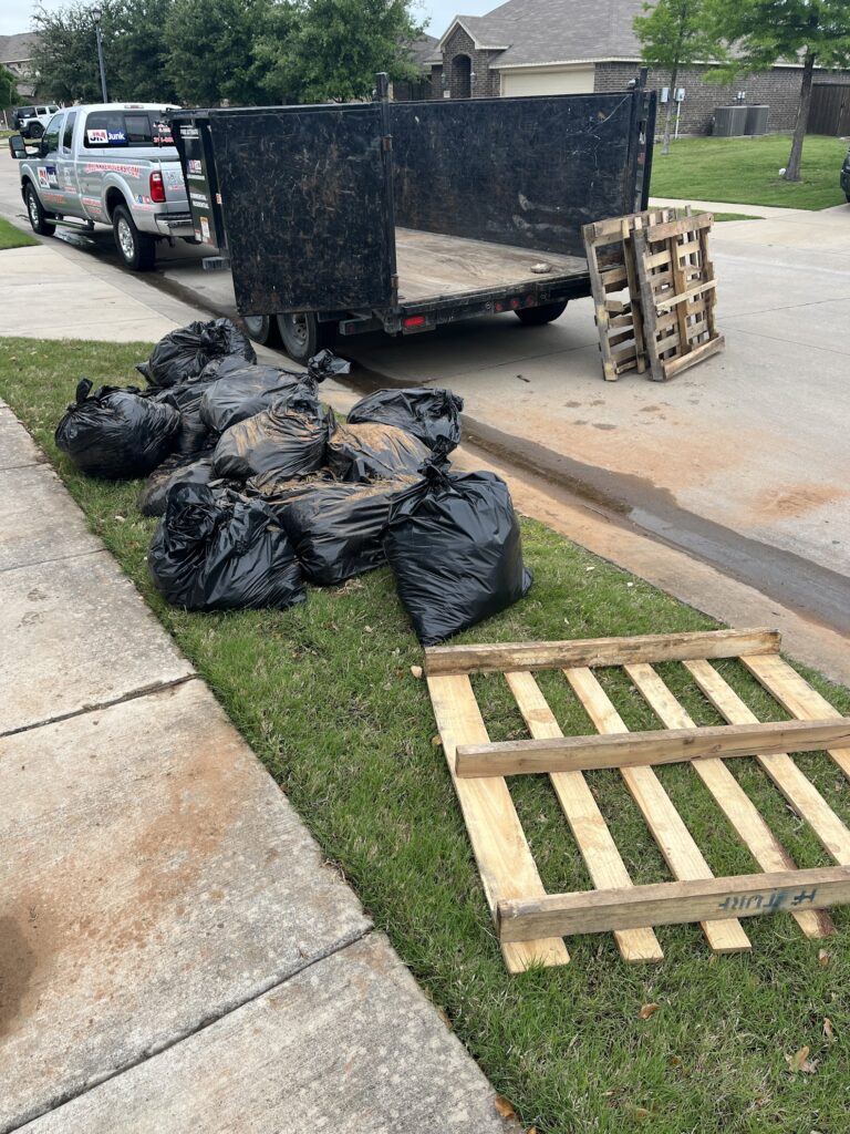pieces of deck being loaded up into the trailer