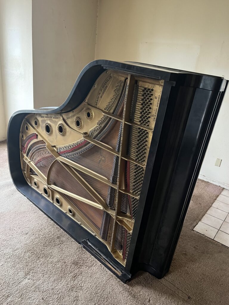 baby grand piano needing removal