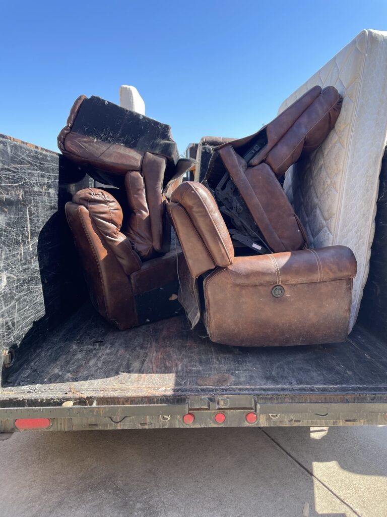 furniture loaded up in jm junk trailer