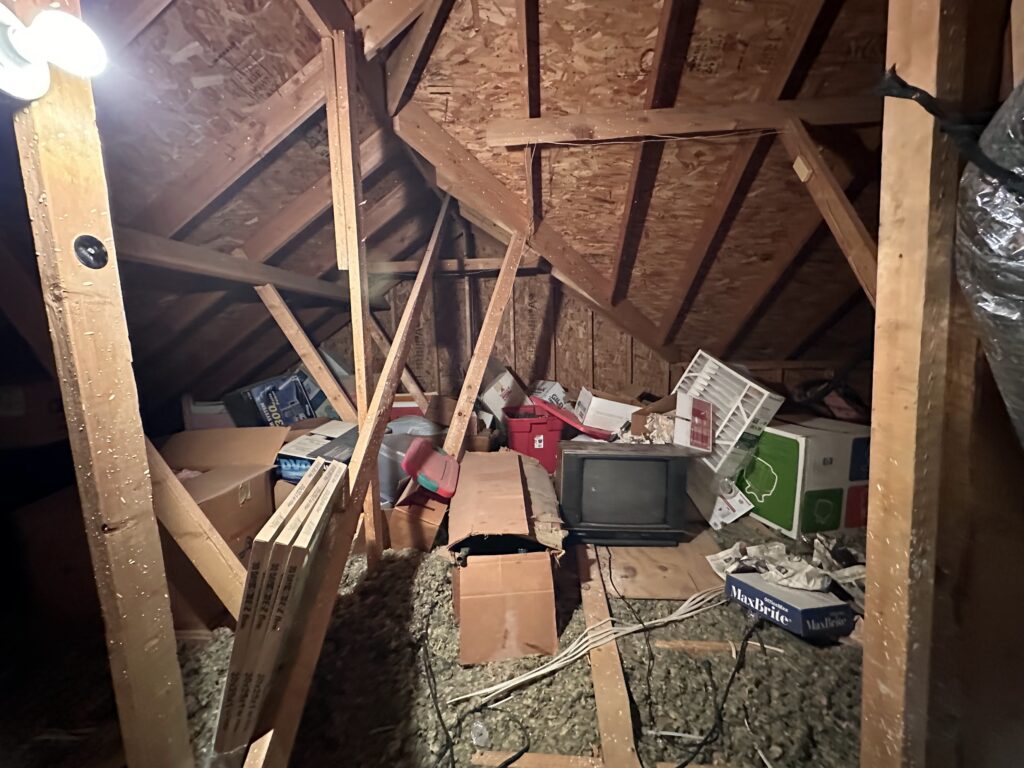 Attic cleanout service in Wylie, TX removing boxes and clutter