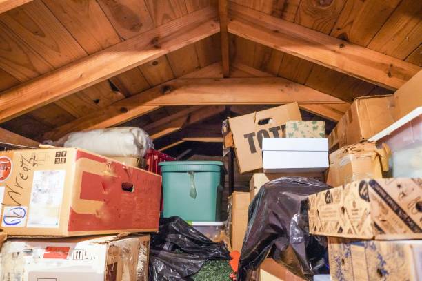 Cluttered attic needing attic cleanout services