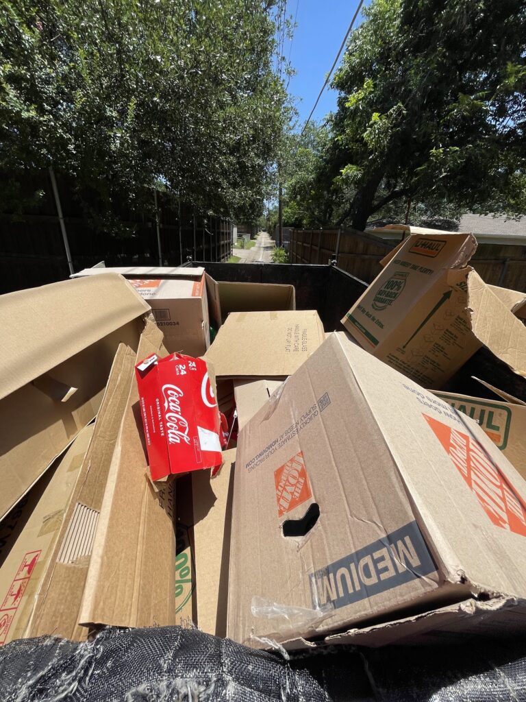 cardboard boxes loaded up in jm junk trailer