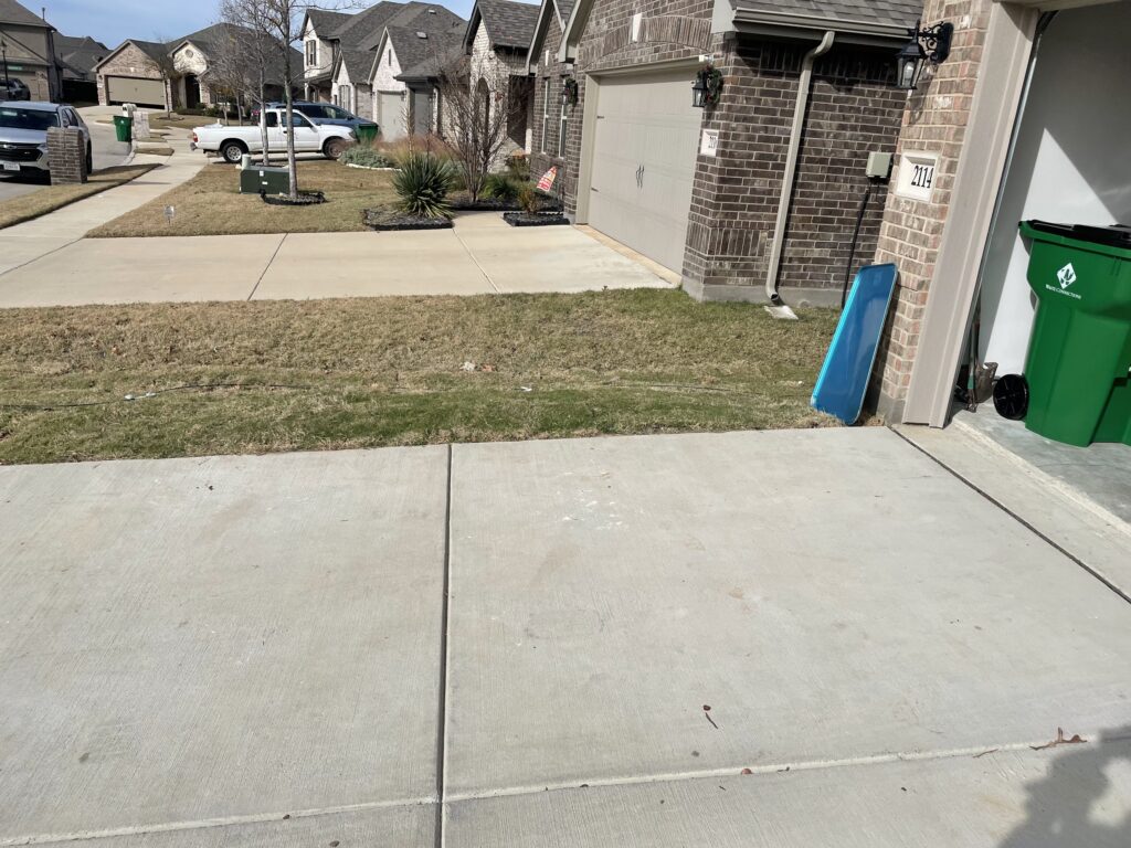 driveway cleared of cardboard boxes