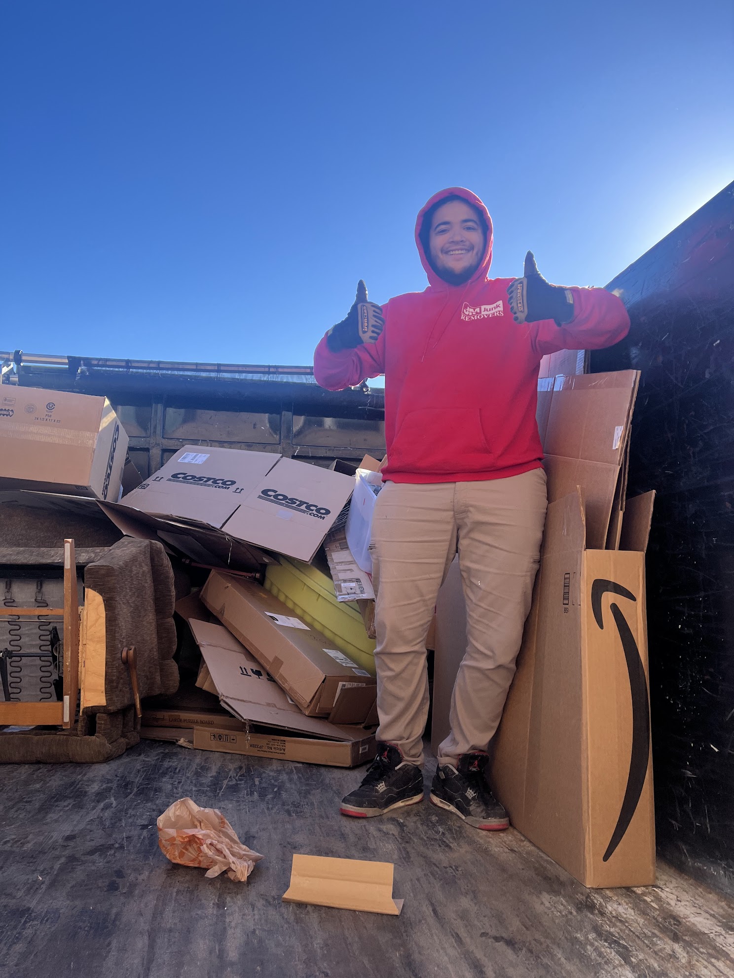 jm junk crew completing cardboard box removal
