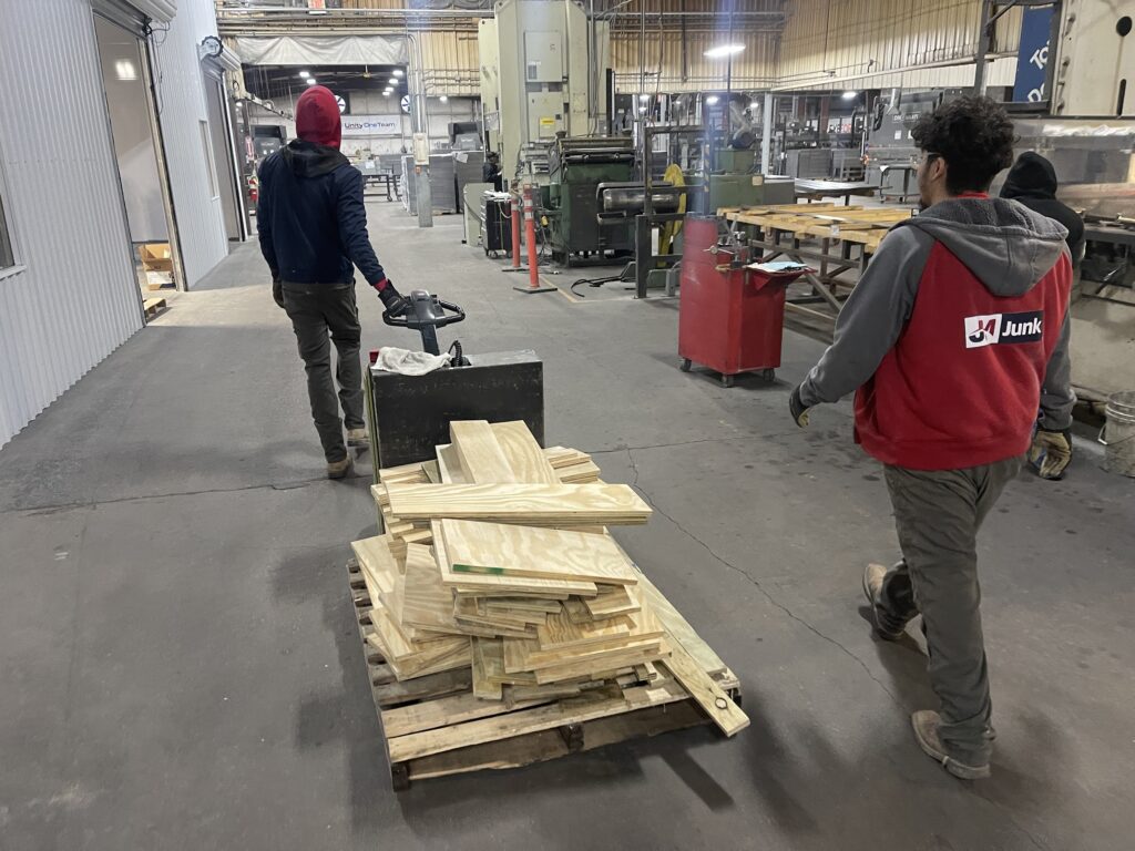 jm junk crew removing and hauling out commercial cleanout debris