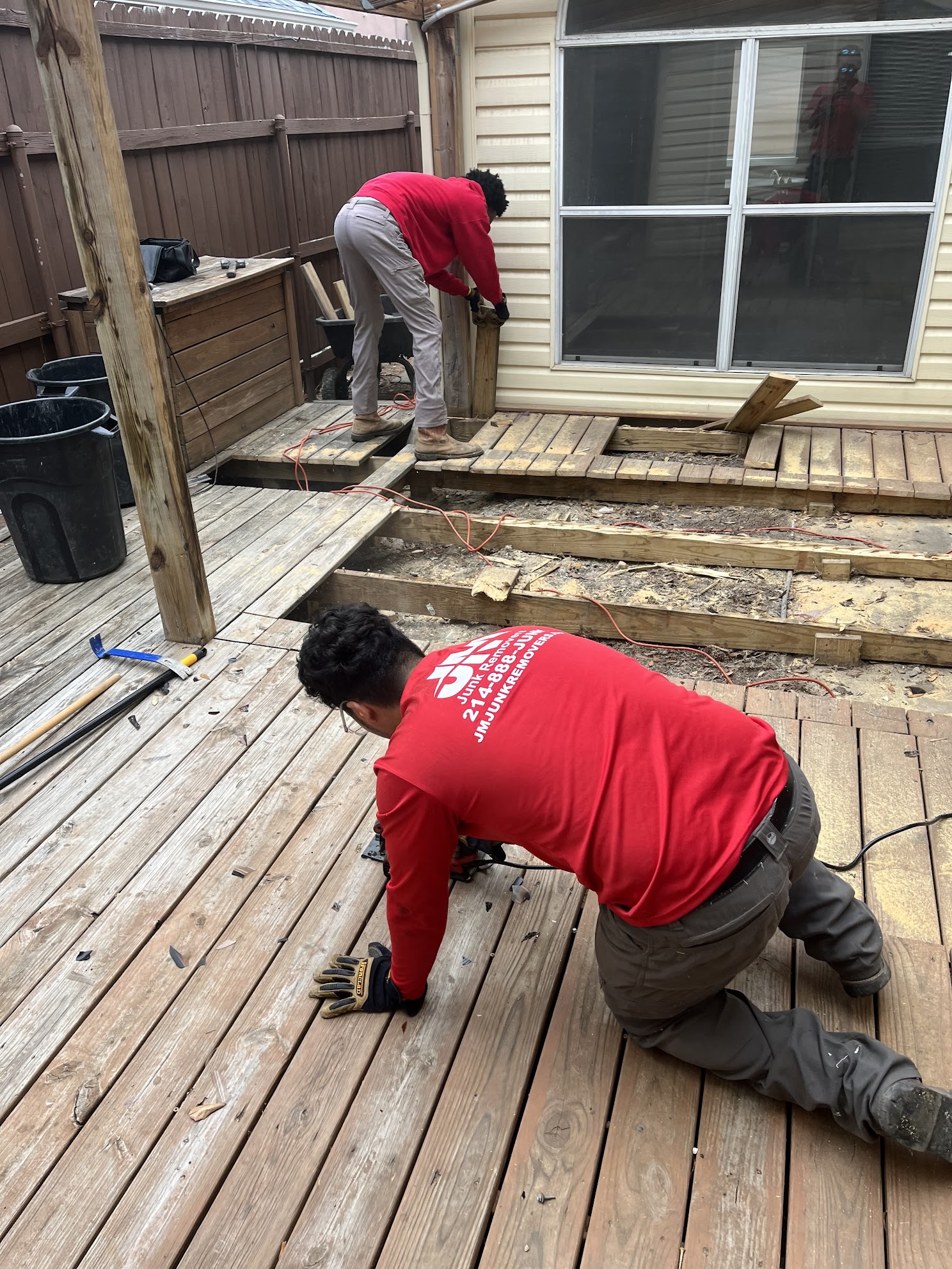 jm junk crew sawing down deck