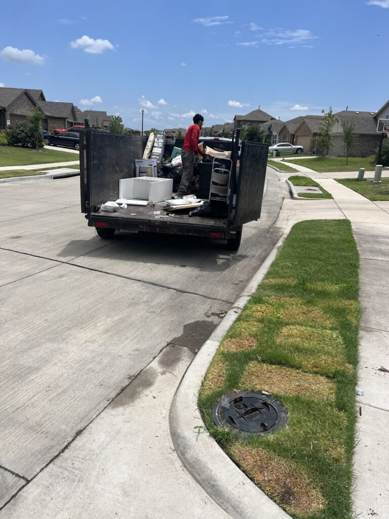 jm junk loading up curbside pickup into trailer