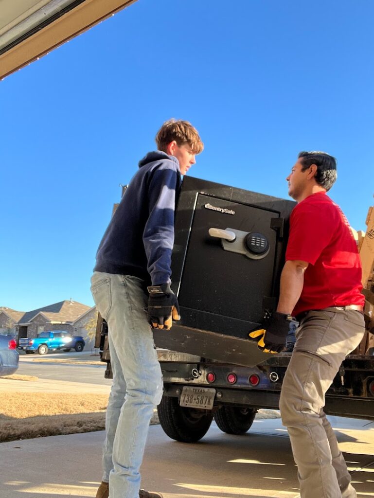 JM junk crew removing safe from Southlake house cleanout