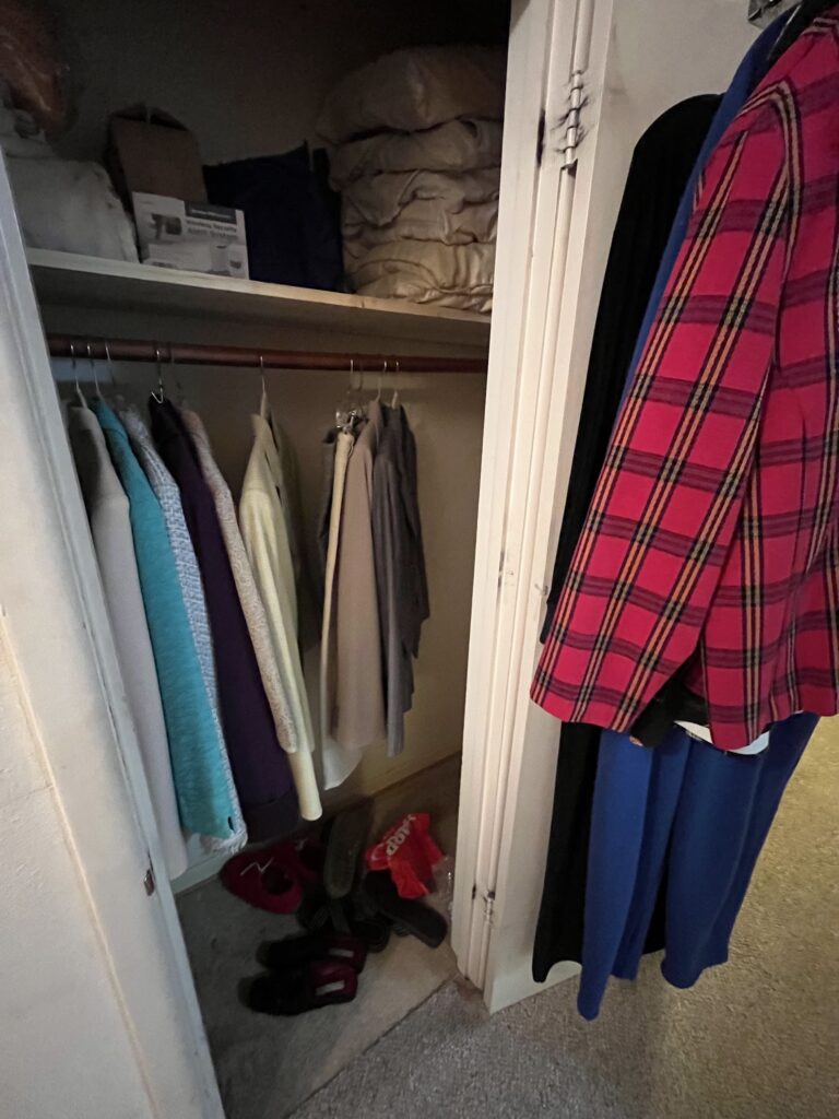closet needing cleaning out estate cleanout
