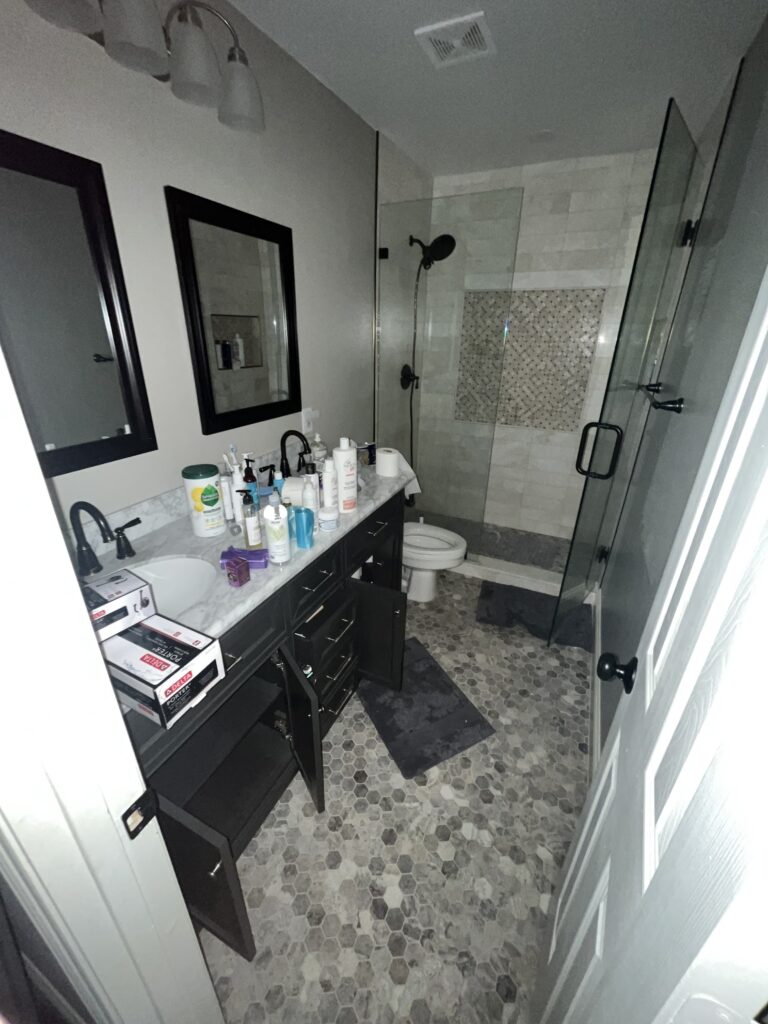 nathroom being cleaned out in foreclosure cleanout