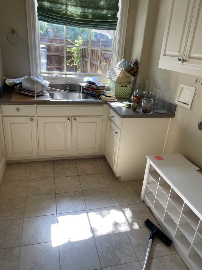laundry room being cleared in foreclosure cleanout